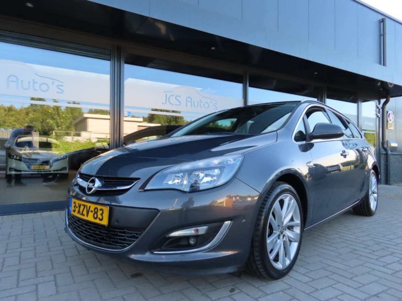 Opel Astra - 1.4 Turbo Cosmo Ecc Cruise Navi Camera 18 Inch 2014 - AutoWereld.nl