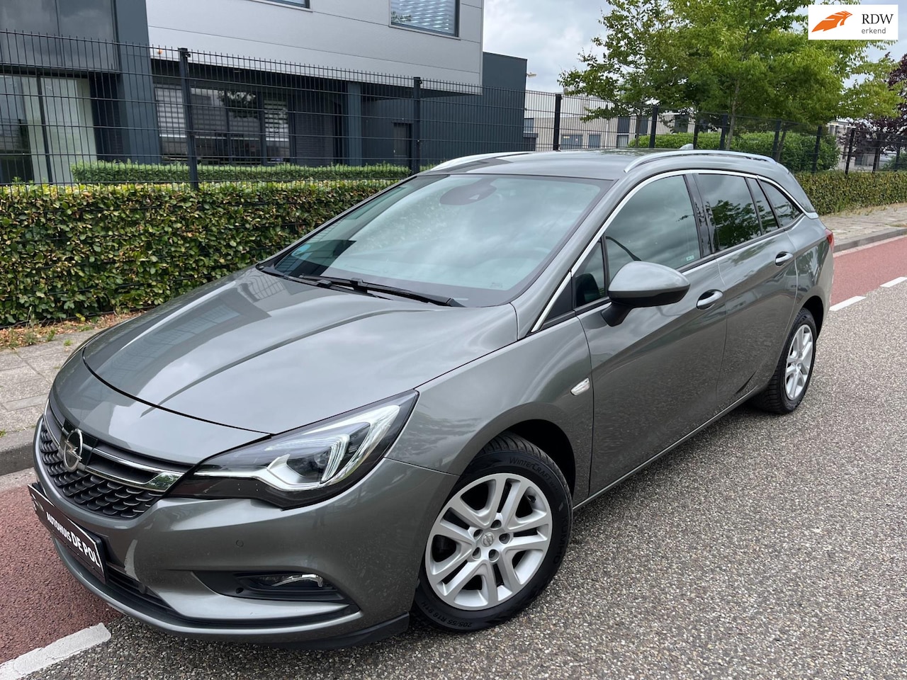 Opel Astra Sports Tourer - 1.4 Business Executive Navi Led Cliamate/Cruise/control Camera - AutoWereld.nl