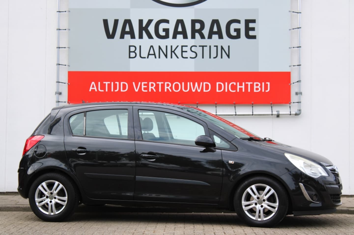 Opel Corsa - 1.2-16V Ann. Edition - AutoWereld.nl
