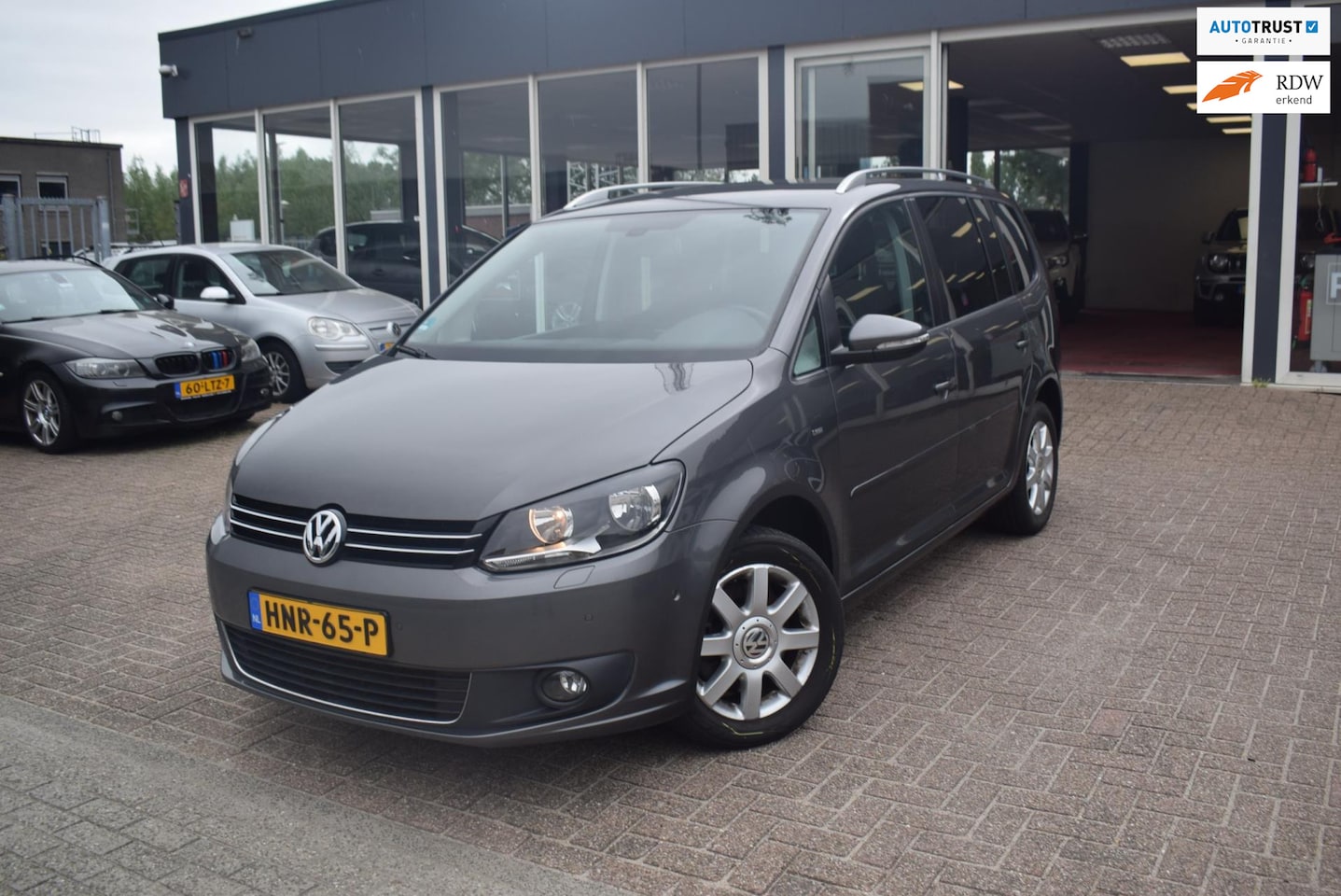 Volkswagen Touran - 1.4 TSI CUP EDITION Comfortline |AUTOMAAT|CLIMATE CONTROL | CRUISE CONTROL |NAVI|VOOR EN A - AutoWereld.nl