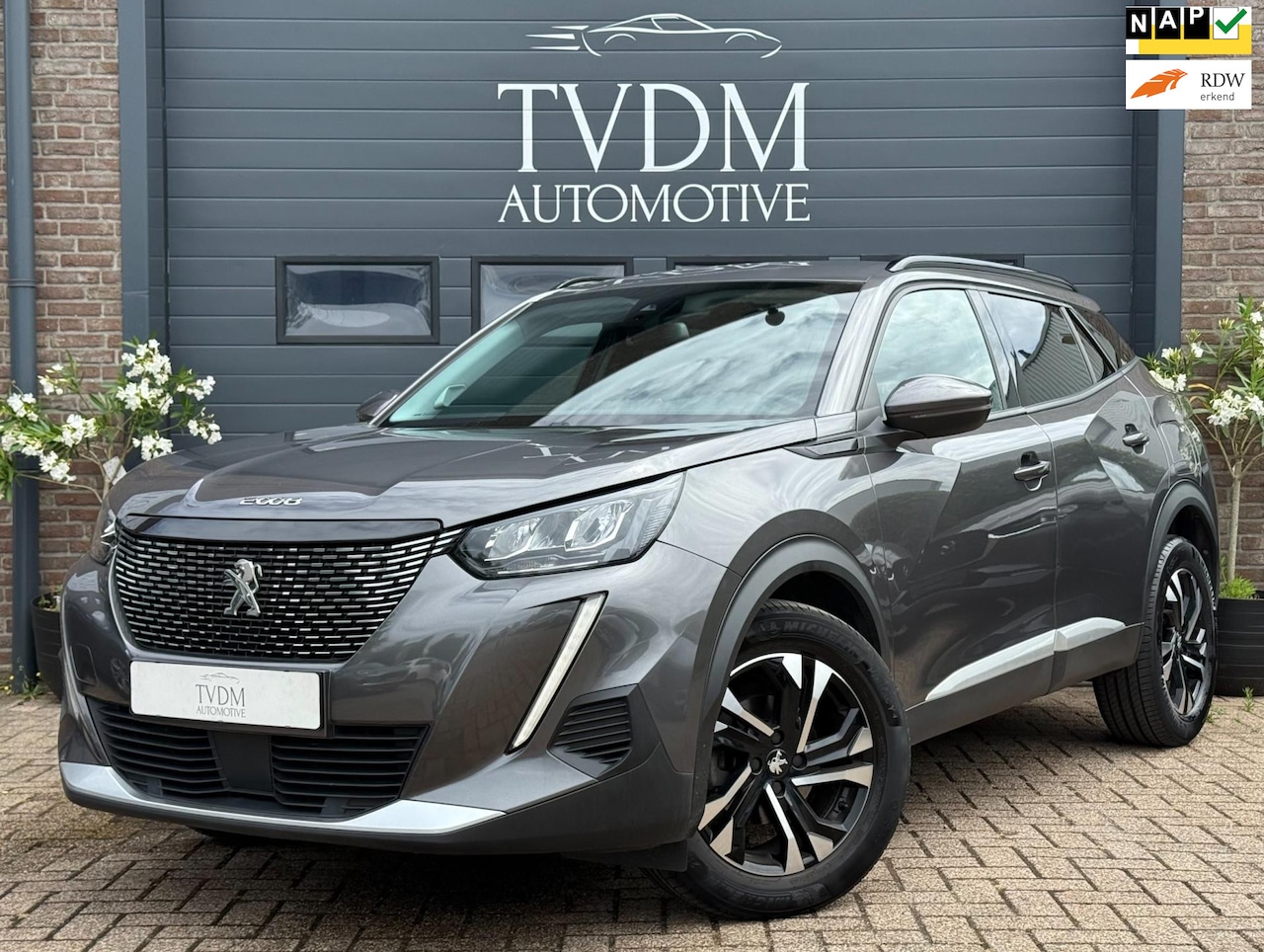Peugeot 2008 - 1.2 PureTech Allure|1/2 LEDER|CARPLAY|CAMERA|STOELVERW - AutoWereld.nl