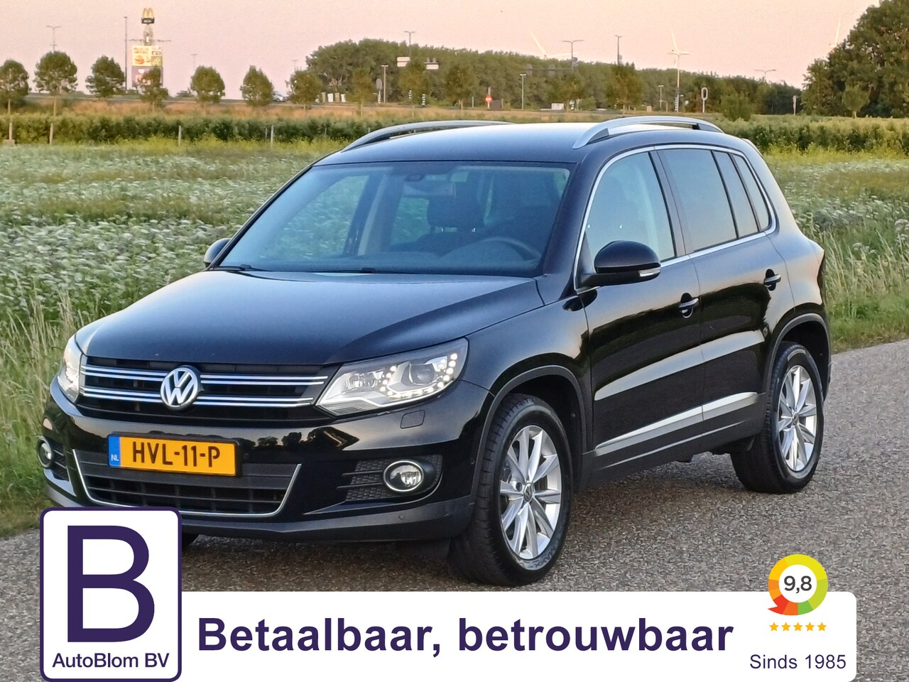 Volkswagen Tiguan - 1.4 TSI Sport&Style /Prachtige auto!/100% onderhoud/Xenon/Navi/ - AutoWereld.nl