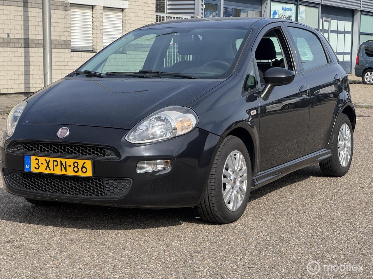 Fiat Punto Evo - 0.9 benzine. Tekst lezen - AutoWereld.nl