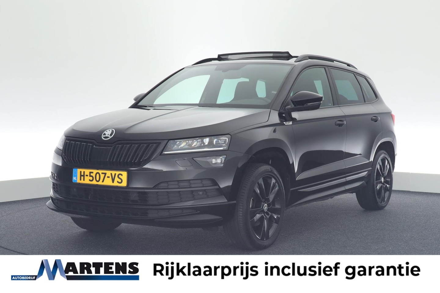 Skoda Karoq - 1.5 TSI 150pk DSG ACT Sportline Business Panoramadak Trekhaak Camera Navi Virtual cockpit - AutoWereld.nl