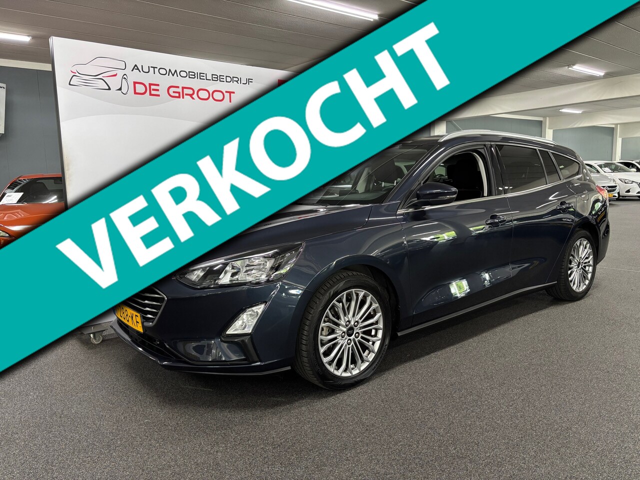 Ford Focus Wagon - 1.0 EcoBoost Hybrid Titanium X Business / NL-auto, Stoelverwarming, Trekhaak, Camera - AutoWereld.nl