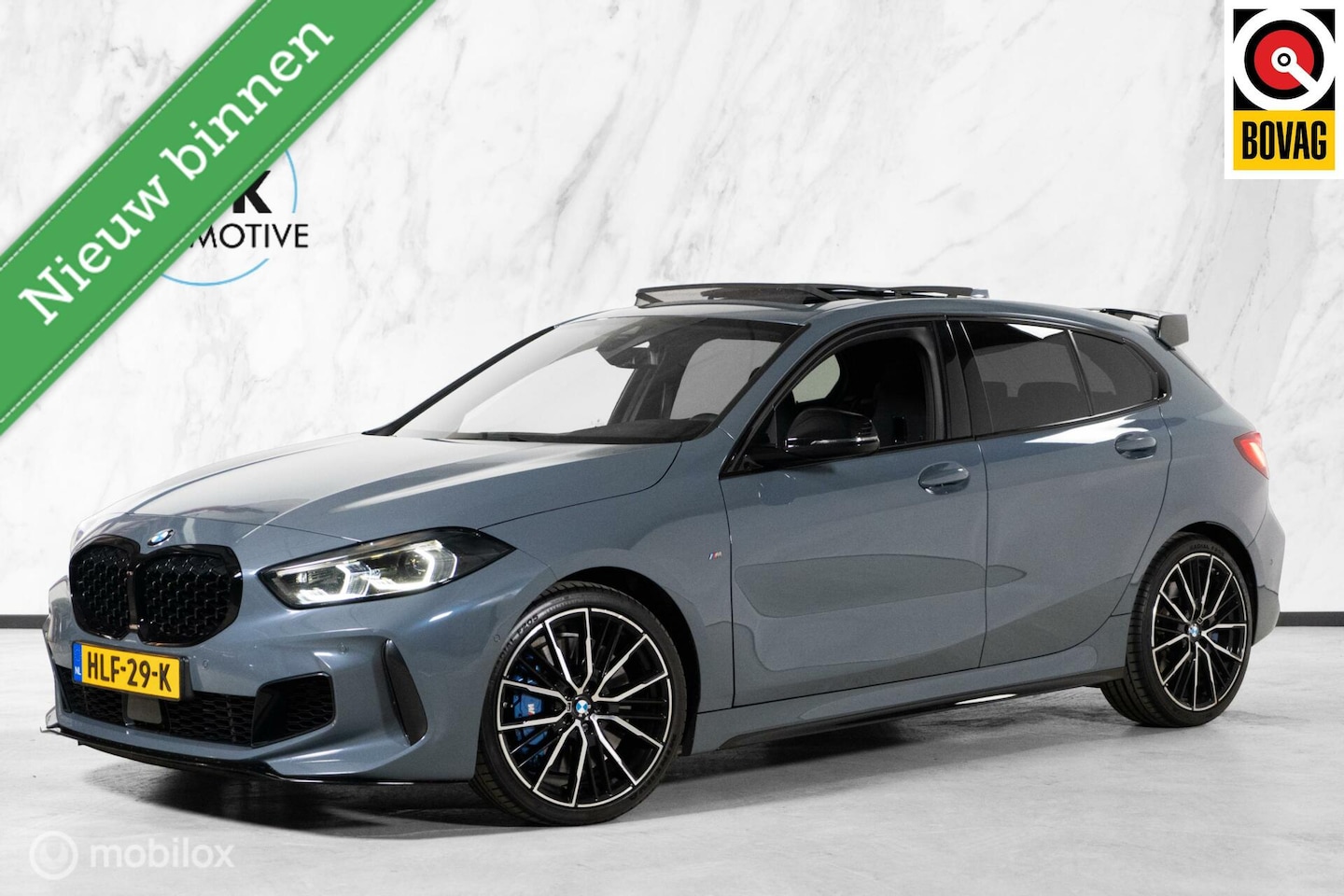 BMW 1-serie - M135i xDrive High Executive PANO|HUD||H&K|LED| - AutoWereld.nl