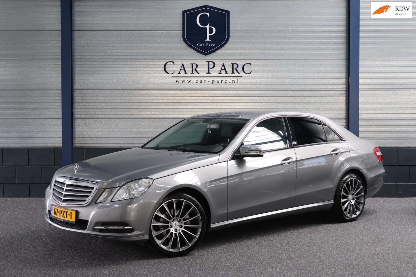 Mercedes-Benz E-klasse - 200 CGI XENON/LEER/PDC/LMV/CRUISE/ECC/12 MND GARANTIE! - AutoWereld.nl