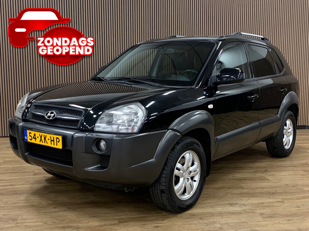 Hyundai Tucson - 2.0i Style Premium|Climate Control|Leder| - AutoWereld.nl