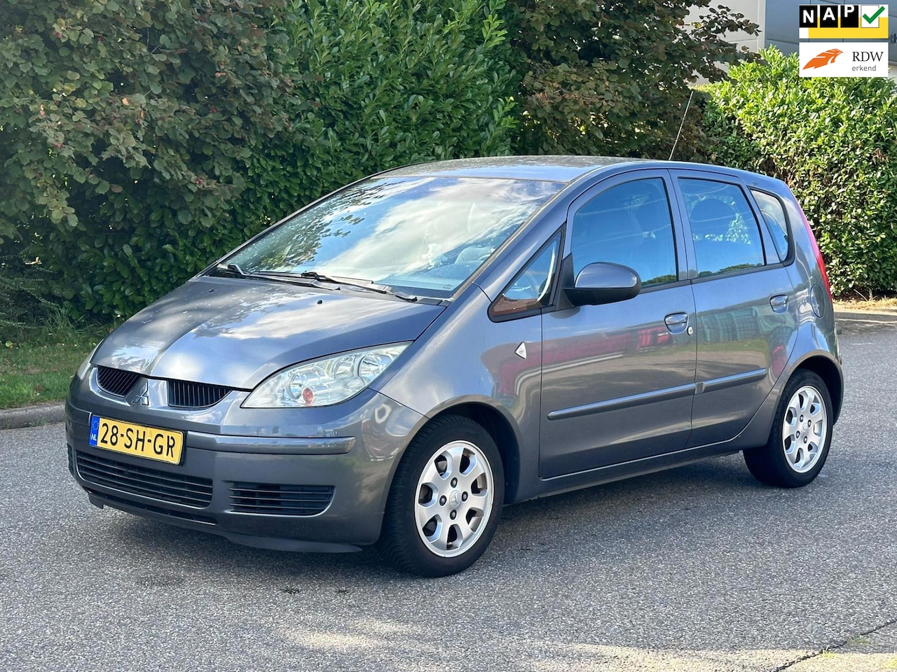 Mitsubishi Colt - 1.3 Invite Automaat*5DR*Airco NAP*LM velgen*2e eigenaar* - AutoWereld.nl