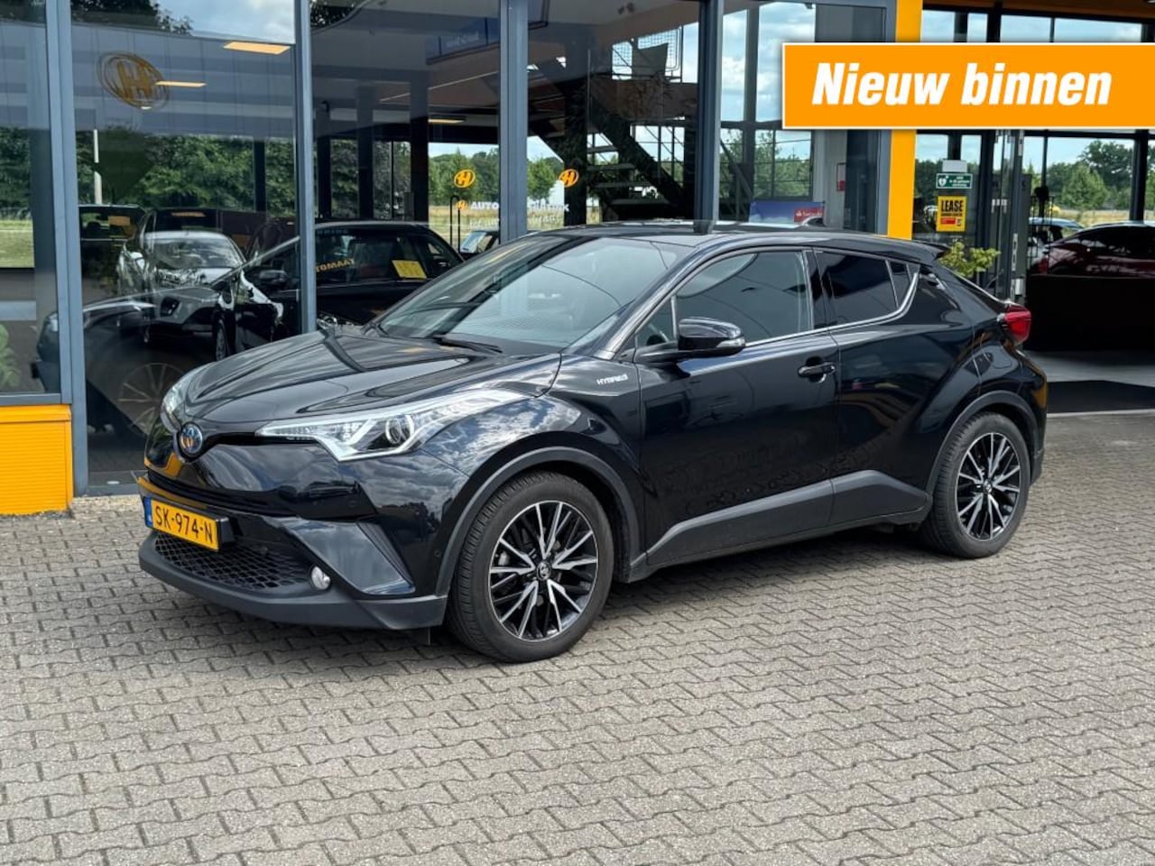 Toyota C-HR - 1.8 Hybrid Style - camera - navi - stoelverwarming - AutoWereld.nl