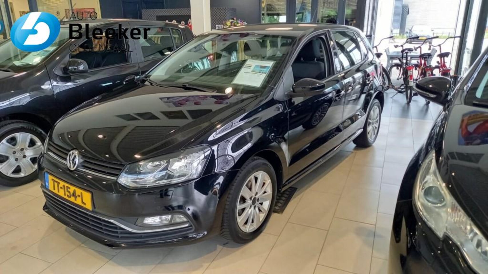 Volkswagen Polo - 1.2 TSi Easyline Airco Stoelverwarming Parkeersensoren - AutoWereld.nl