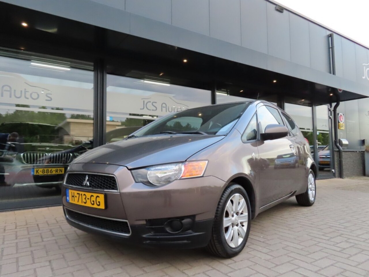 Mitsubishi Colt - 1.1 Edition One Airco Pdc Licht-Metaal 2011 - AutoWereld.nl
