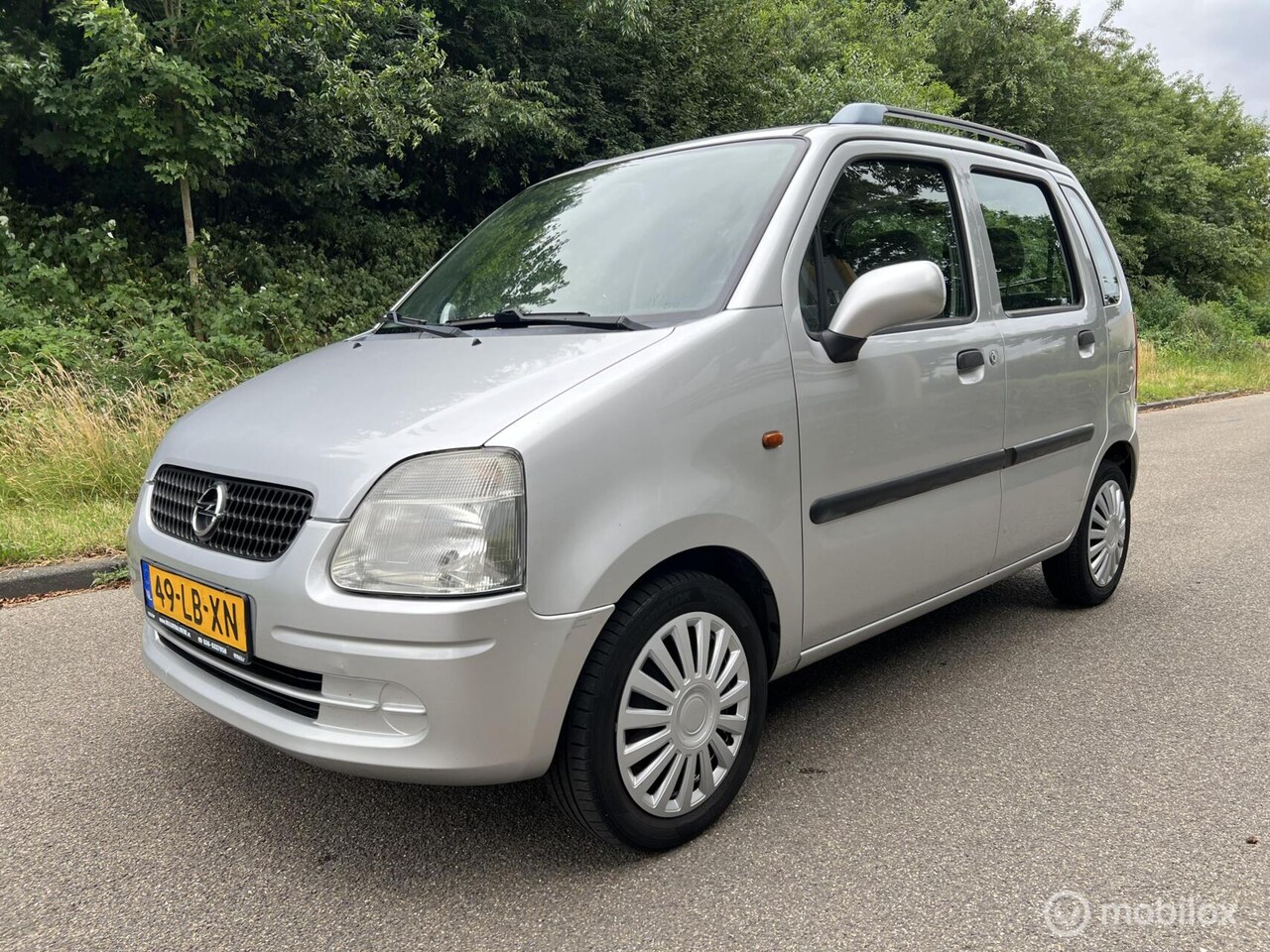 Opel Agila - 1.0-12V Comfort 1.0-12V Comfort - AutoWereld.nl