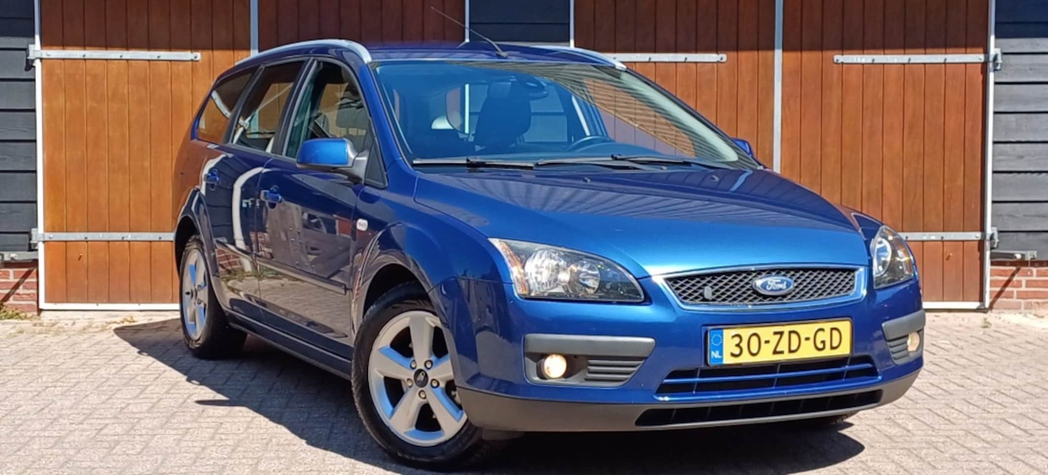 Ford Focus Wagon - 1.8-16V Amb, Trekhaak, Airco, Cruise controle, NAP - AutoWereld.nl