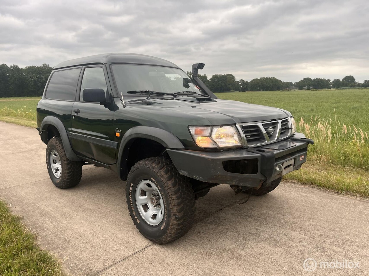Nissan Patrol GR - 2.8 TDI 4WD VERHOOGD | TERREINBANDEN | ETC - AutoWereld.nl