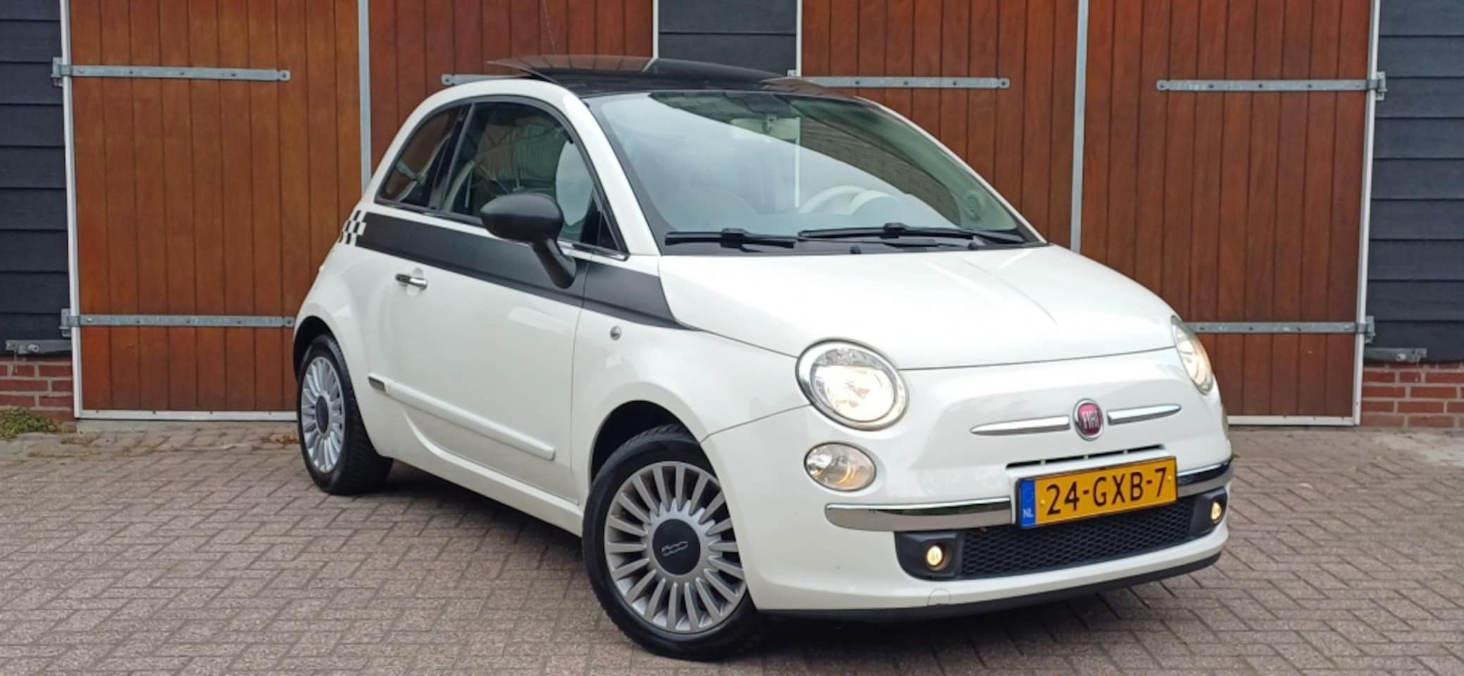Fiat 500 - 1.2 Lounge 1.2 Lounge, Schuif/kantel dak, NAP, Airco, All seasonbanden - AutoWereld.nl