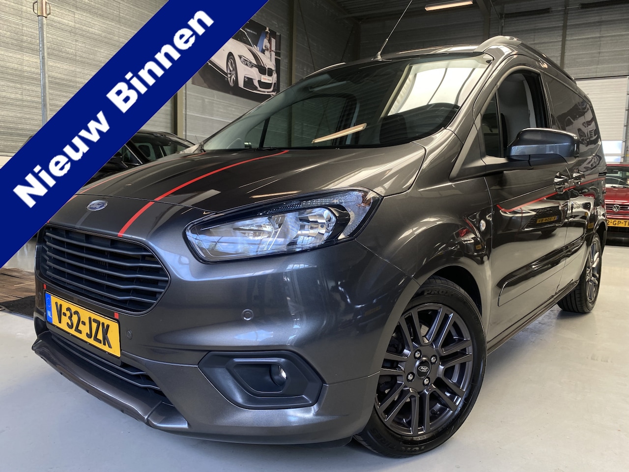 Ford Transit Courier - 1.0 Ambiente Half leder, 100pk, Navi, Camera - AutoWereld.nl