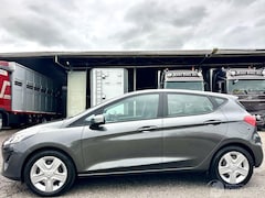 Ford Fiesta - 1.1i 71pk Trend 5drs - 48dkm nap - airco - cruise - navi - licht + regensensor - line assi