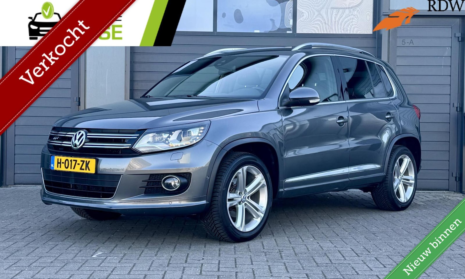 Volkswagen Tiguan - 2.0 TSI 4motion | R LINE | Lage KM Stand | Automaat| 4x4 | Uniek | Trekhaak | - AutoWereld.nl