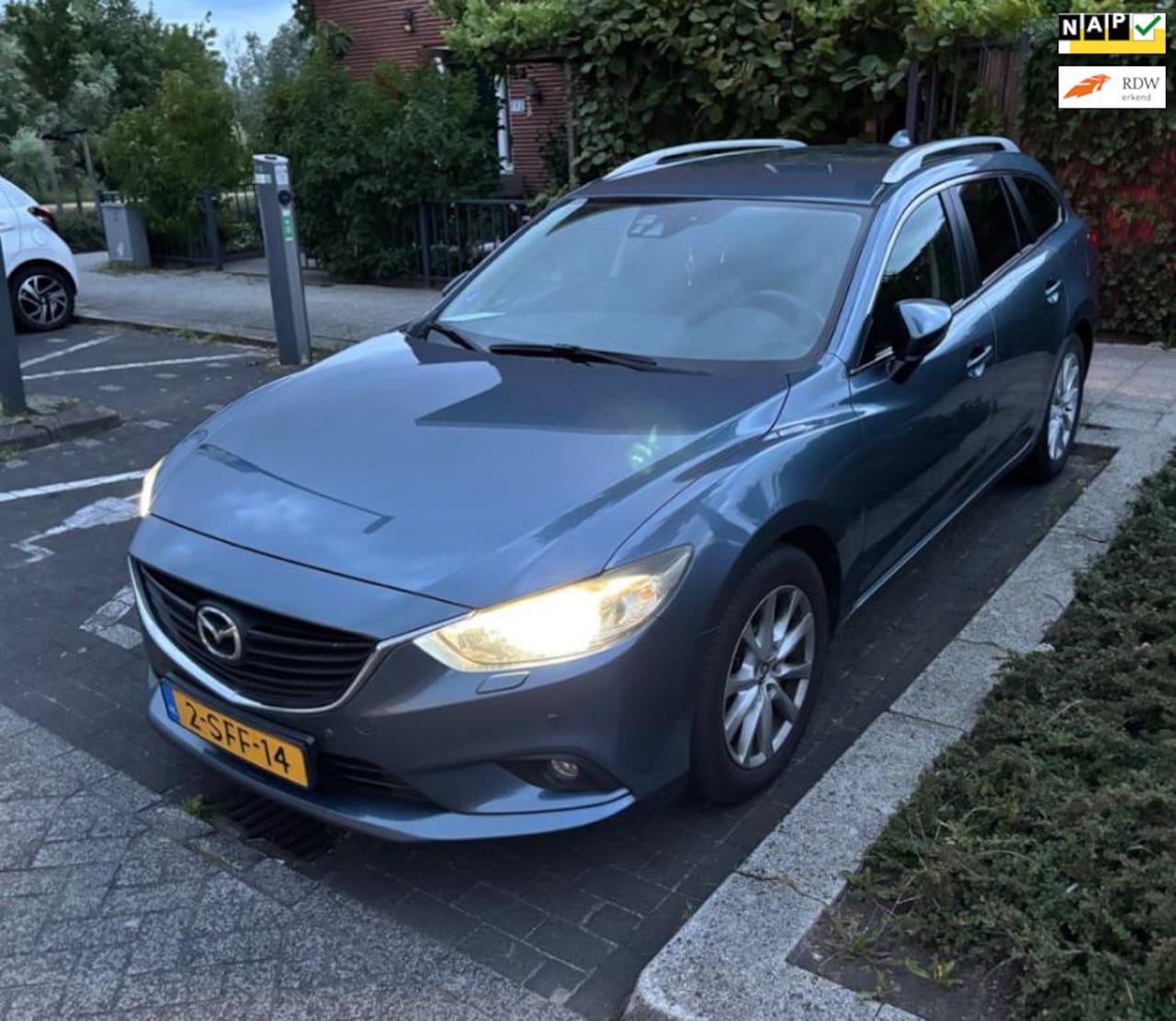 Mazda 6 Sportbreak - 2.0 Red Dot Edition | Navi | NL auto | NAP - AutoWereld.nl