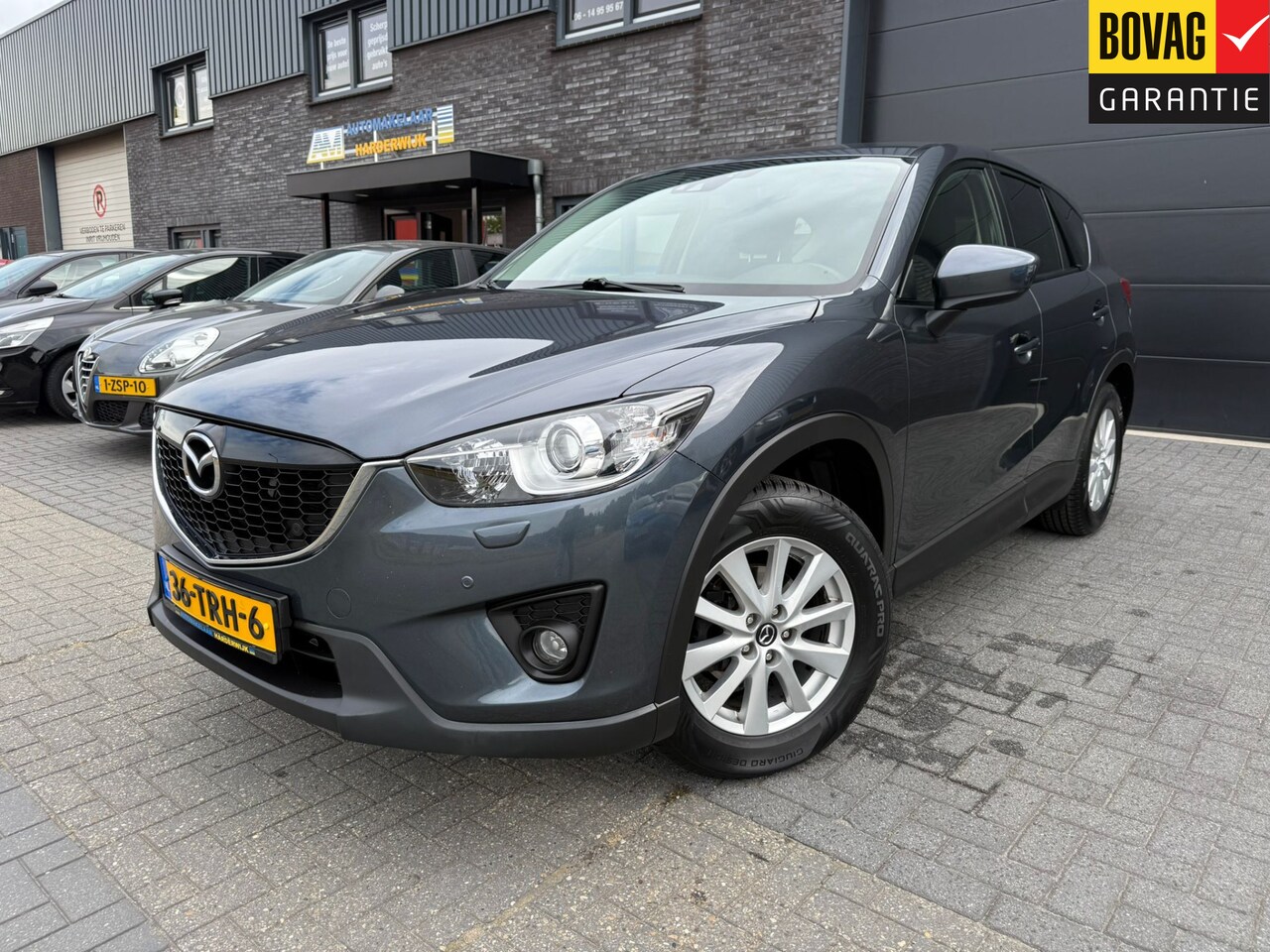 Mazda CX-5 - 2.0 TS+ Lease Pack 2WD | 12MND GARANTIE | NW APK | AIRCO | CRUISE | NAVI | PDC | LMV | - AutoWereld.nl