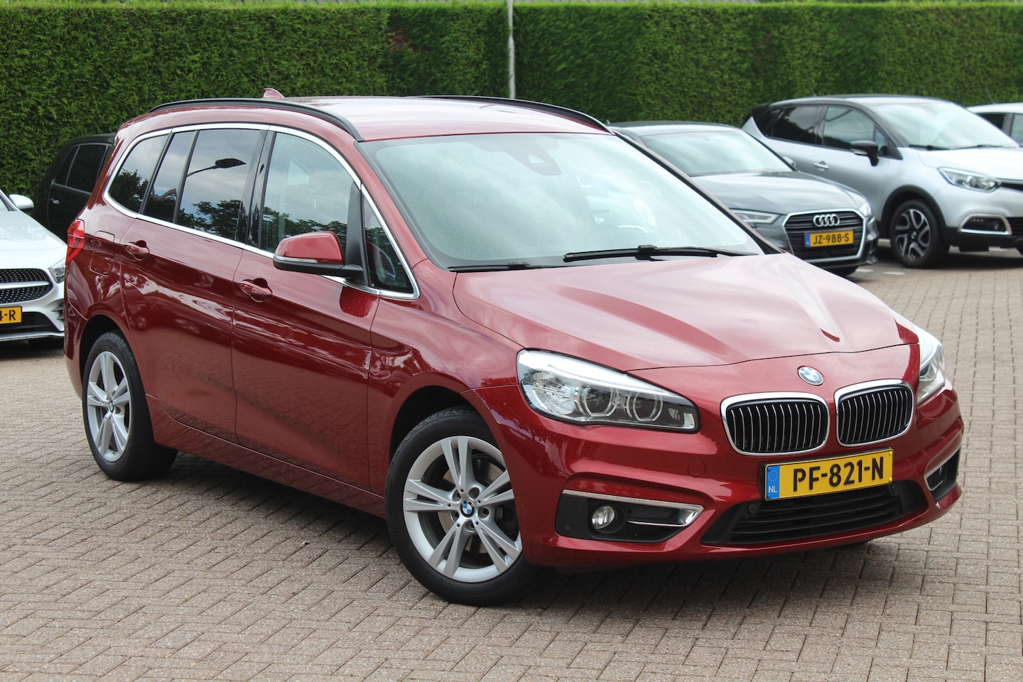 BMW 2-serie Gran Tourer - 218i 7p. Executive / Trekhaak / Leder / Navigatie / Keyless entry / Parkeerhulp V+A / Crui - AutoWereld.nl