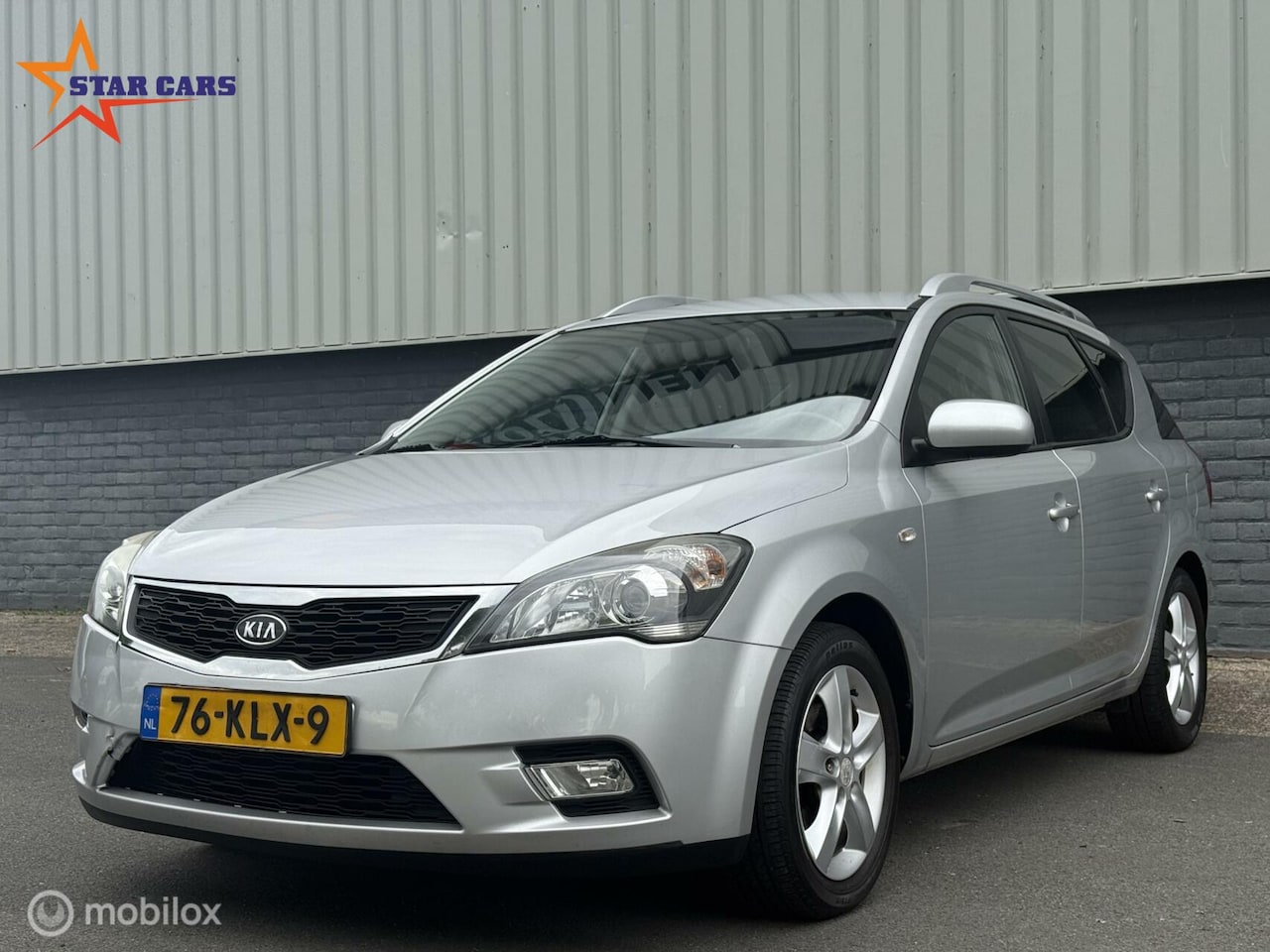 Kia Cee'd Sporty Wagon - 1.4CVVT Seven|Airco| Cruise|Navi| APK - AutoWereld.nl