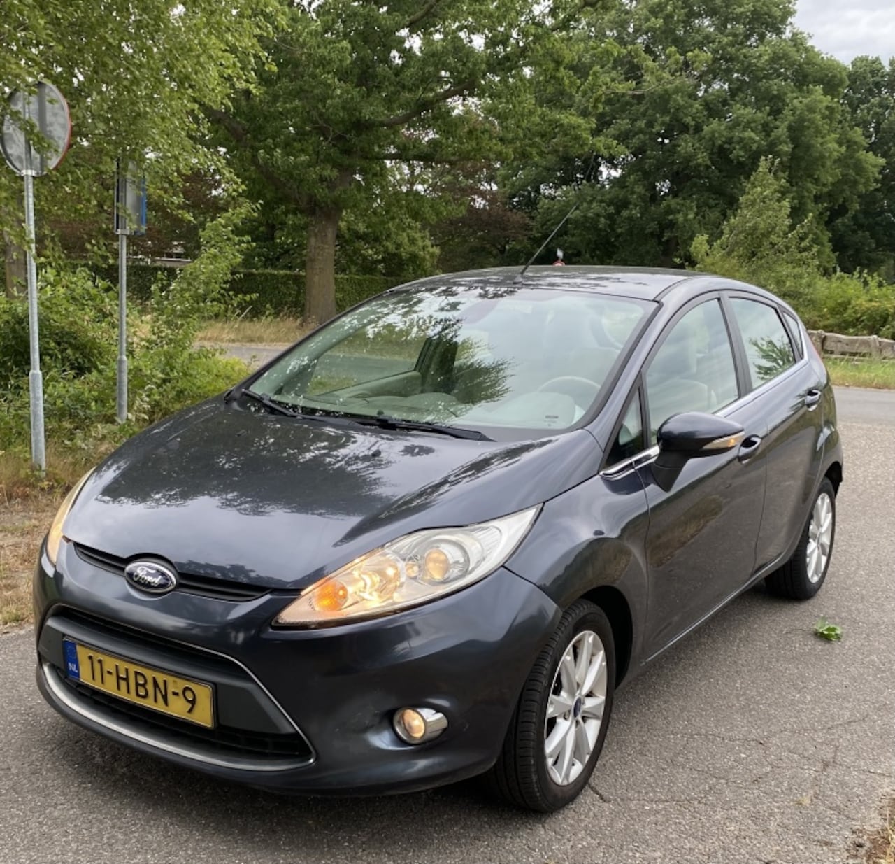 Ford Fiesta - 1.25 Ghia 1.25 Ghia - AutoWereld.nl