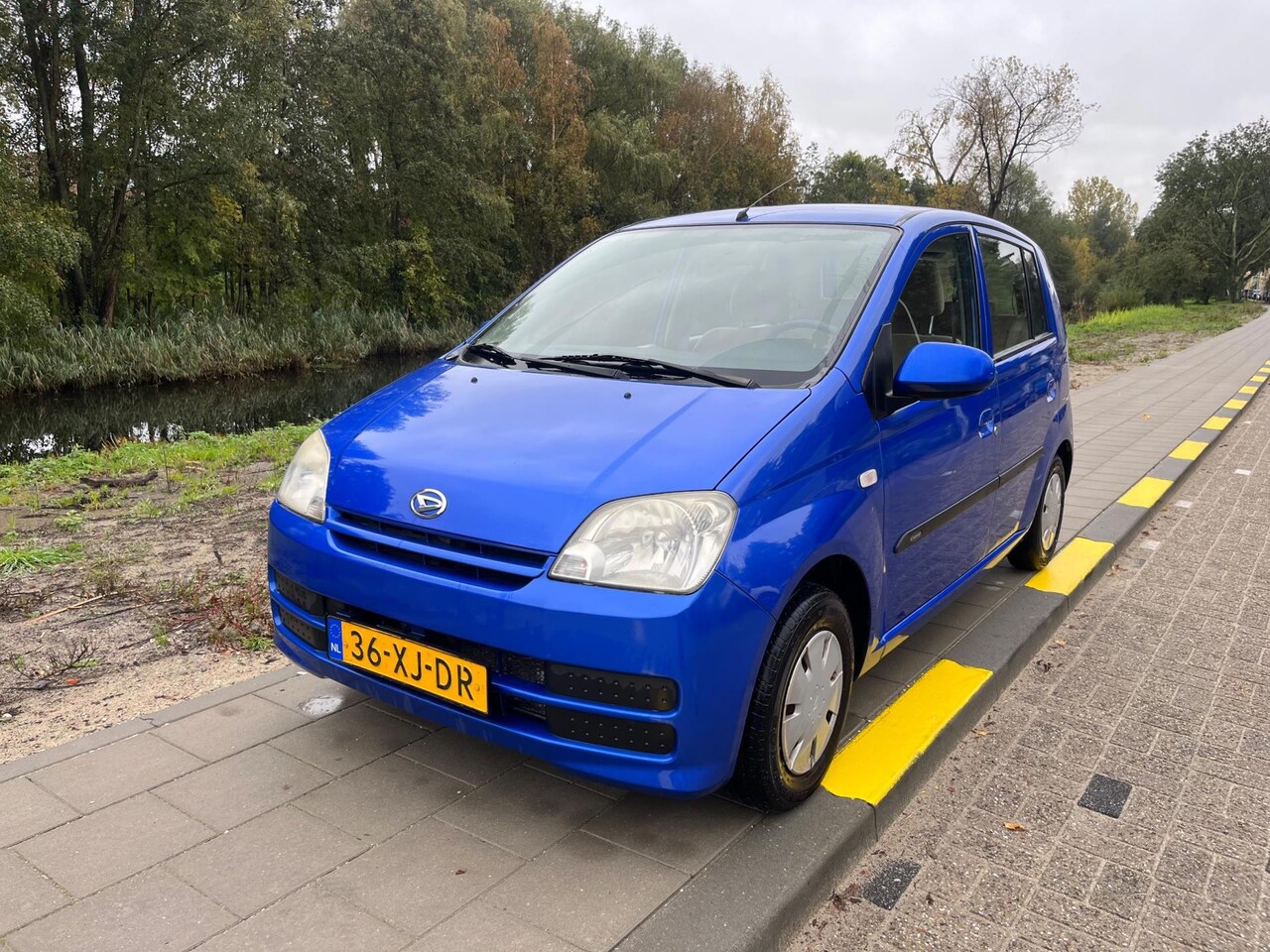Daihatsu Cuore - 1.0-12V Nagano/nwe koppeling - AutoWereld.nl