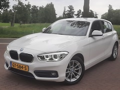 BMW 1-serie - 118i 1.5 136pk Airco Cruise-control Navigatie Bluetooth