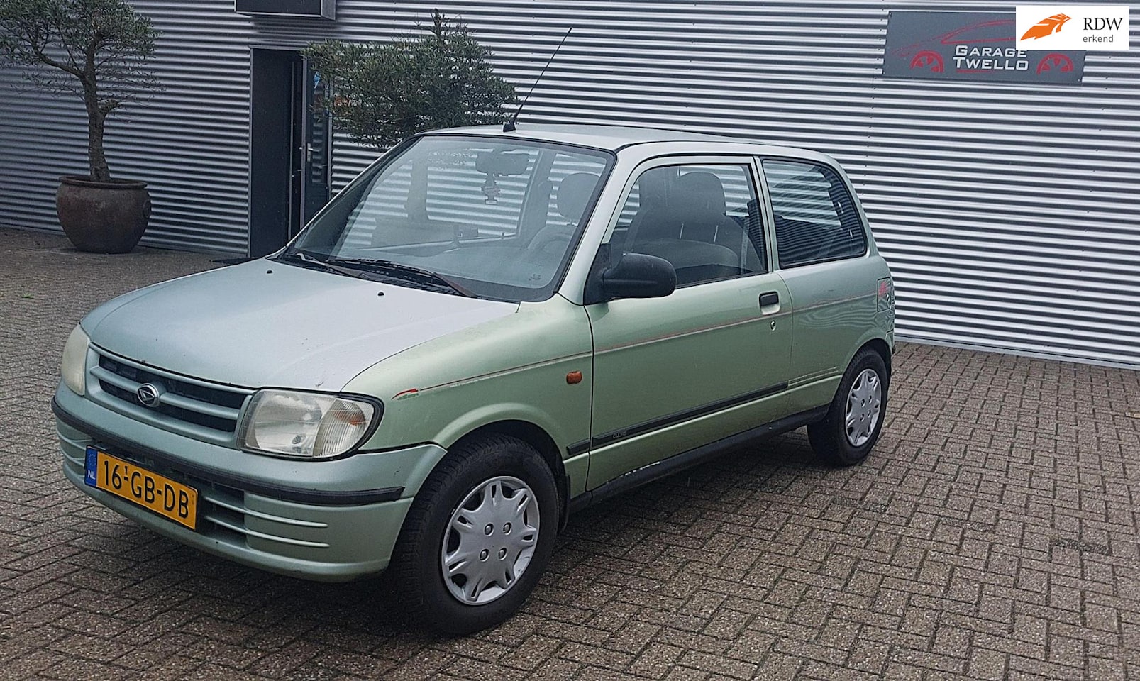 Daihatsu Cuore - 1.0-12V XTi 1.0-12V XTi - AutoWereld.nl