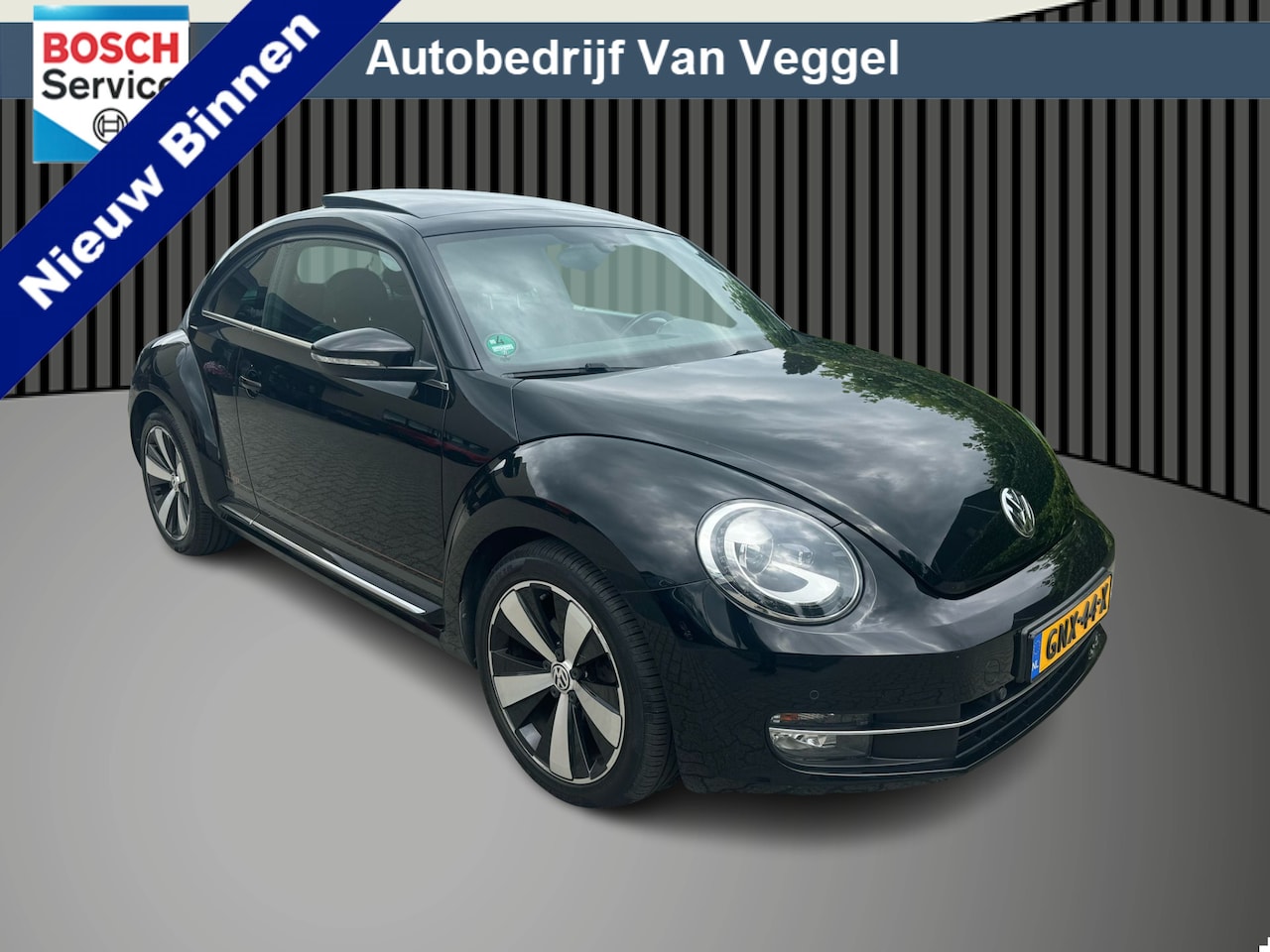 Volkswagen Beetle - 1.2 TSI Design BlueMotion xenon, pano, cruise, stoelverw - AutoWereld.nl