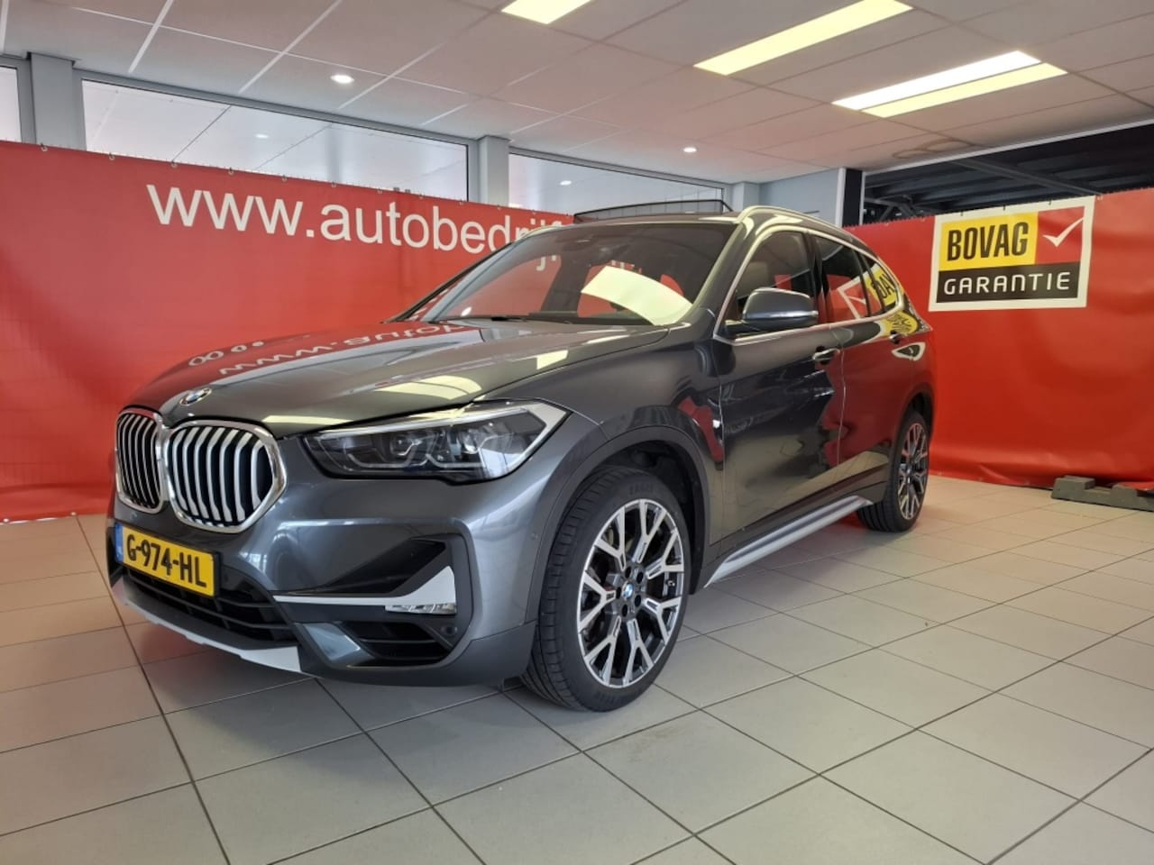 BMW X1 - sDrive20i VDL Nedcar Edition High Executive, Panorama dak, Trekh - AutoWereld.nl