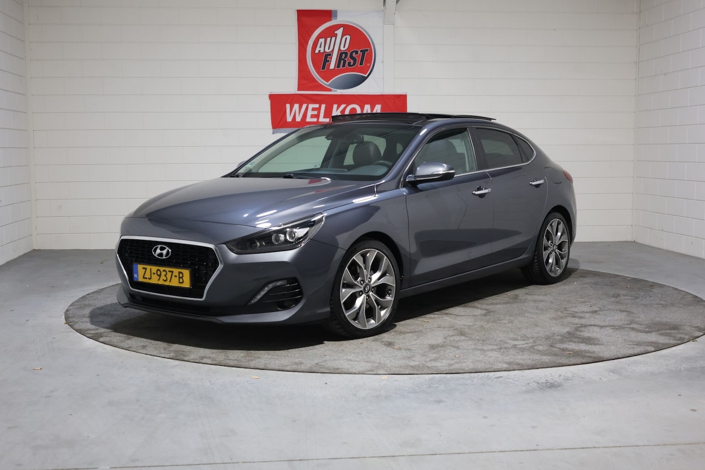 Hyundai i30 Fastback - 1.4 T-GDI Premium 1.4 T-GDI Premium, Meest Luxe uitvoering, Volledig onderhouden, Xenon, Leer, Navigatie, Pa - AutoWereld.nl
