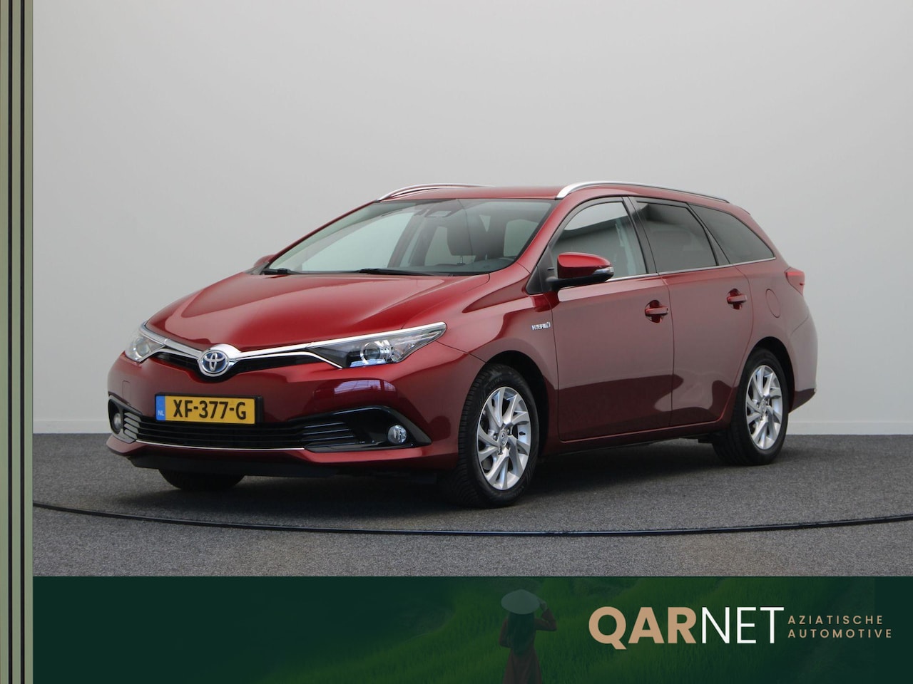 Toyota Auris Touring Sports - 1.8 Hybrid Executive Go | Navigatie | Cruise Control | Achteruitrijcamera | Lichtmetalen V - AutoWereld.nl