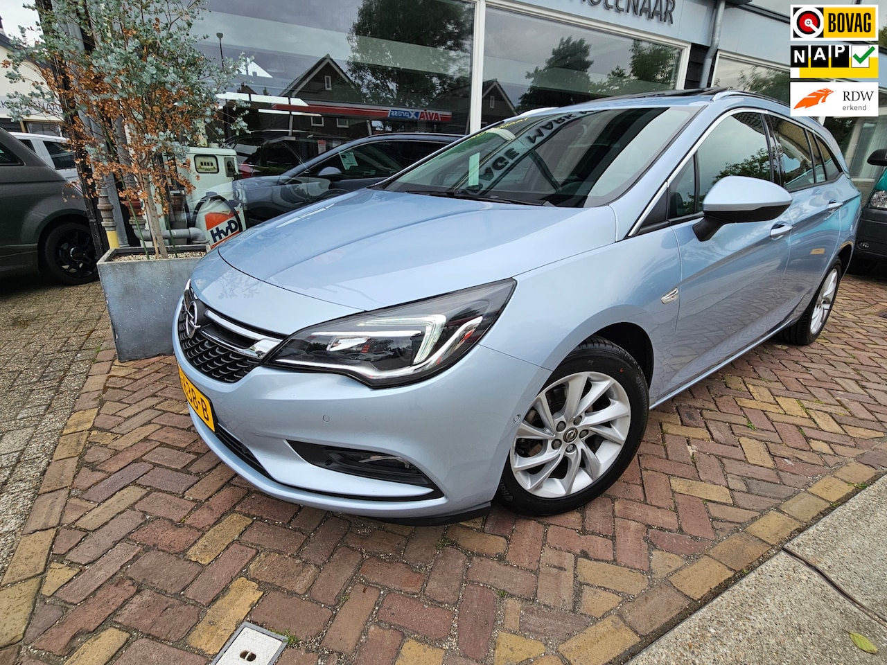 Opel Astra Sports Tourer - 1.4 Innovation 1.4 Innovation,automaat,open dak,leder - AutoWereld.nl