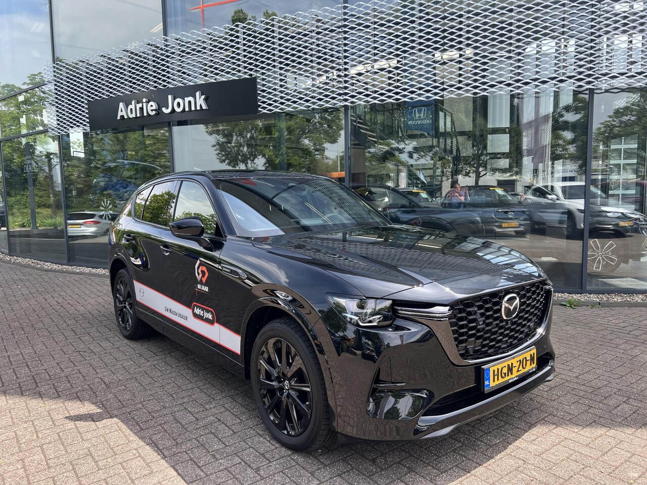 Mazda CX-60 - 2.5 e-SkyActiv PHEV Homura Plus | AUTOMAAT | APPLE CARPLAY | BOSE AUDIO | LEDER | DODEHOEK - AutoWereld.nl
