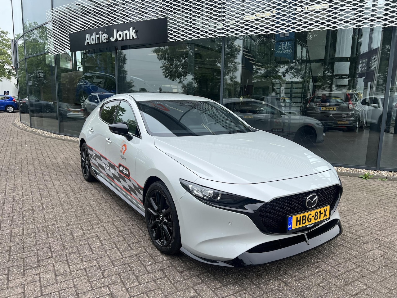 Mazda 3 - 2.5 e-SkyActiv-G M Hybrid 140 Homura | AEROPAKKET | APPLE CARPLAY | DODEHOEKDETECTIE | ADA - AutoWereld.nl