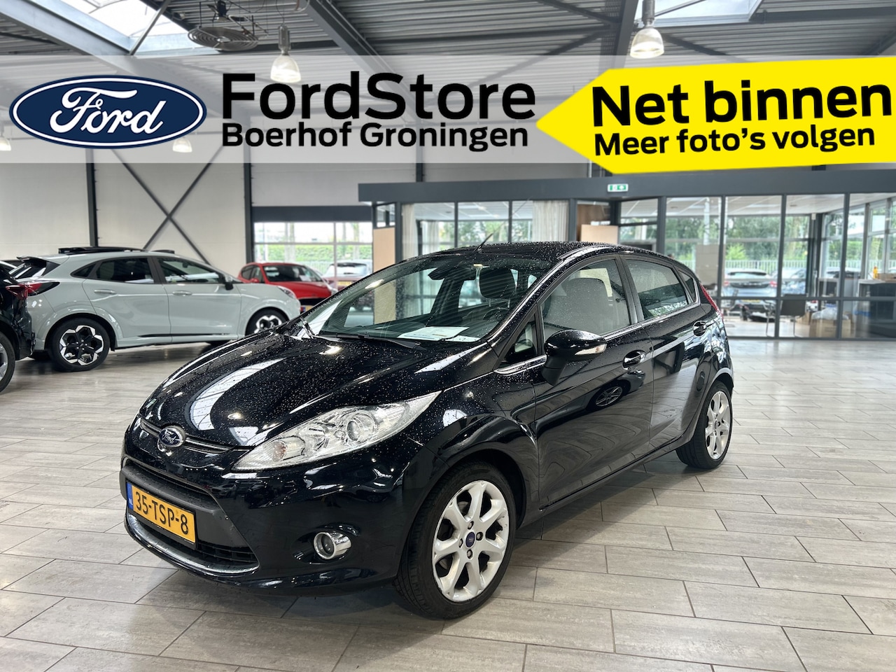 Ford Fiesta - 1.25 82 pk Titanium | Leer | Clima | PDC | Voorruitverw. | Bluetooth | Cruise | 15" LMV - AutoWereld.nl