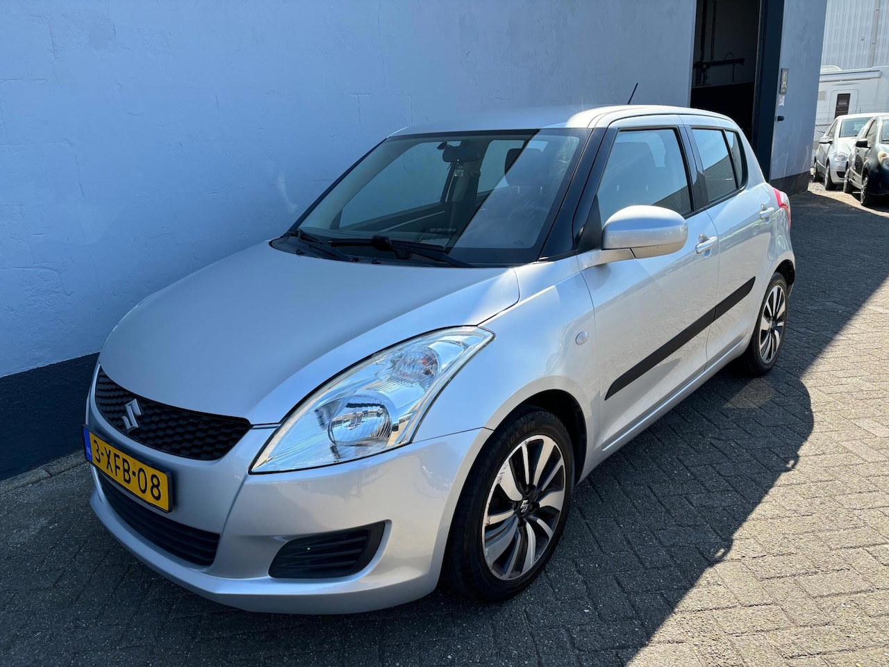 Suzuki Swift - 1.2 Comfort EASSS 5-Deurs - Airco - AutoWereld.nl