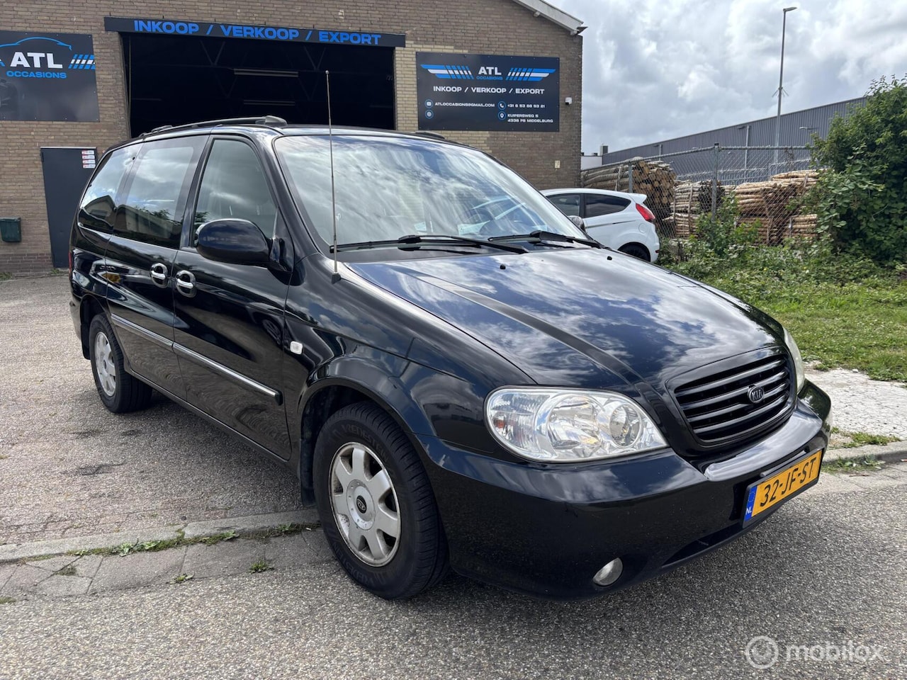 Kia Carnival - 2.5 V6 EX 2.5 V6 EX - AutoWereld.nl