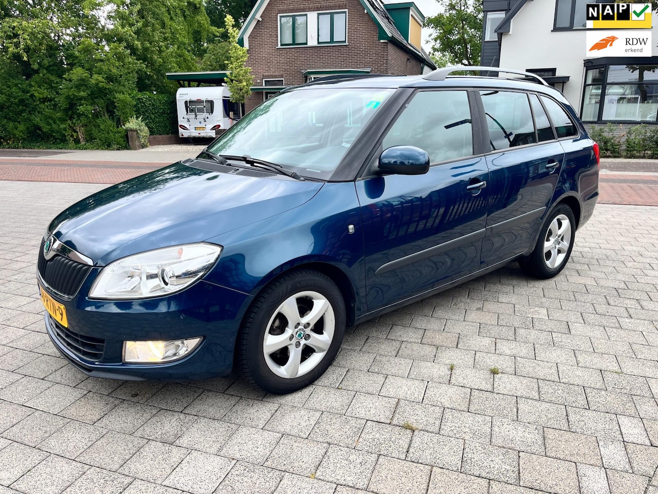 Skoda Fabia Combi - 1.2 TSI Tour Airco Isofix Cruise Trekhaak PDC Fris - AutoWereld.nl