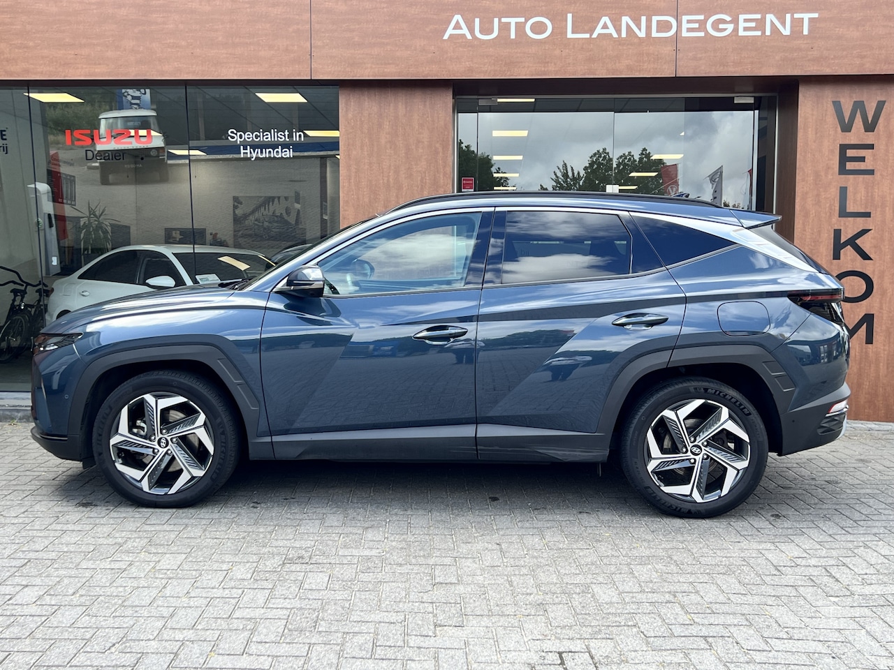 Hyundai Tucson - 1.6 T-GDI PHEV Premium 4WD | Stoel/ stuur verwarming | Apple/ android carplay | 360 Camera - AutoWereld.nl
