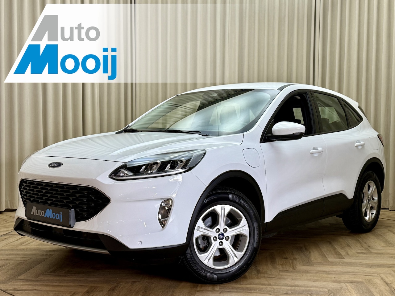 Ford Kuga - 2.5 PHEV Trend *Apple-Carplay* Stoelverwarming / ECC Clima / Cruise / Navigatie / Lane Ass - AutoWereld.nl