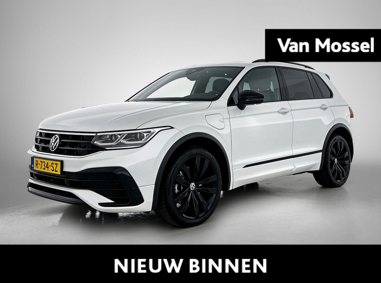 Volkswagen Tiguan - 1.4 TSI eHybrid R-Line Business+ | SoH 94,8% | Automaat | Black Style | Panorama Schuif/Ka - AutoWereld.nl