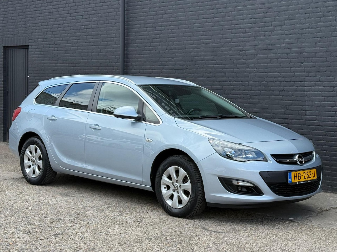 Opel Astra Sports Tourer - 1.6 CDTi Blitz AIRCO | CRUISE | ELEK RAMEN | NAVI | NWE APK - AutoWereld.nl
