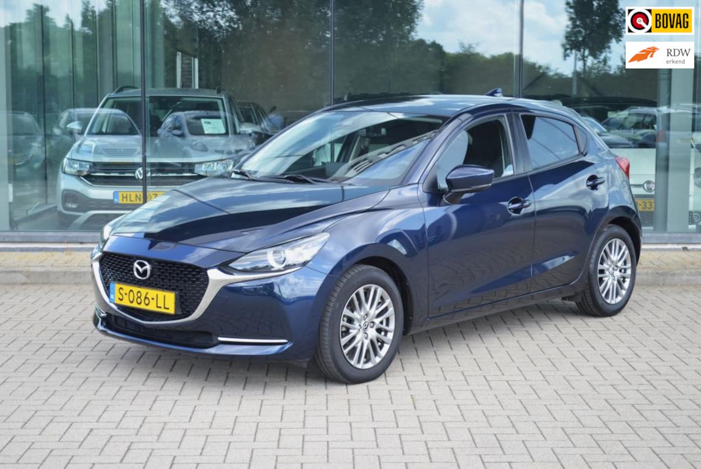 Mazda 2 - 1.5 Skyactiv-G Luxury |Stoelverwarming | Keyless | Carplay | Dodehoek detectie | Stuur ver - AutoWereld.nl