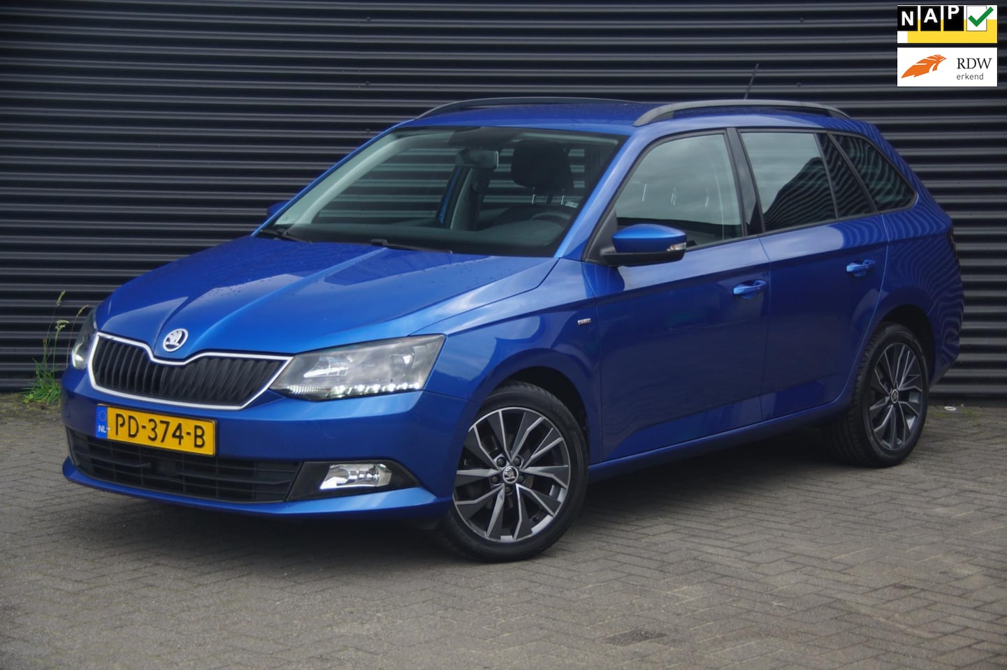 Skoda Fabia Combi - 1.2 TSI Drive | Navi | Cruise | PDC | - AutoWereld.nl