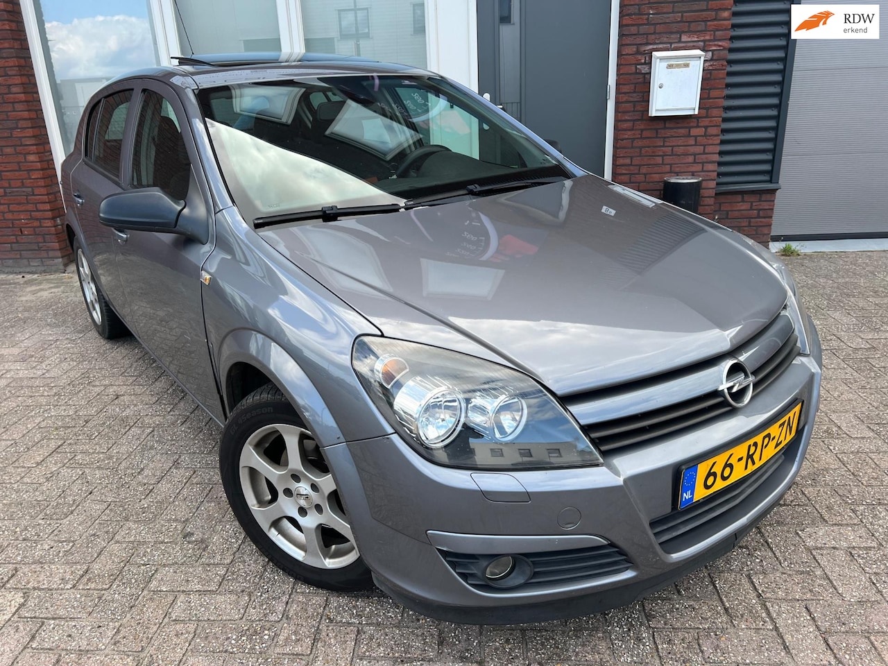 Opel Astra - 1.8 Enjoy / Schuifdak / Navi / Cruise / Carplay / AUT - AutoWereld.nl