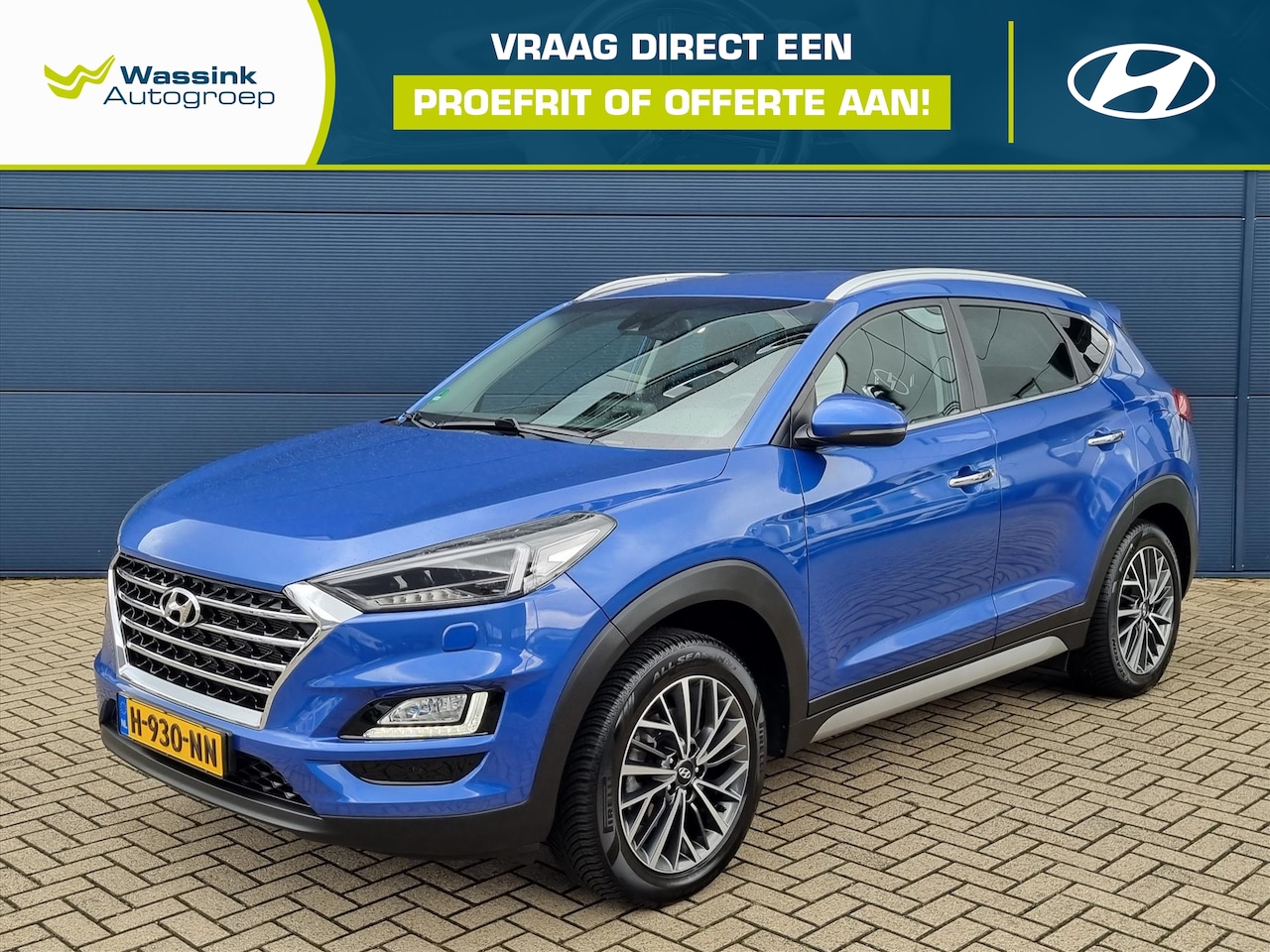 Hyundai Tucson - 1.6 GDi 132pk Premium | Camera | Trekhaak | Navigatie | Stoelverwarming | All Season Bande - AutoWereld.nl